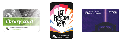 Three different library card designs including the classic green Sacramento Public Library card, Let Freedom Read card and Sacramento Kings themed card